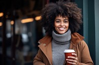 Cup holding coffee smile. 