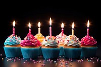 Colorful happy birthday cupcakes sprinkles dessert candle. AI generated Image by rawpixel.