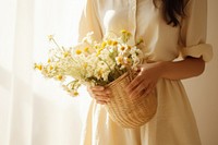 Woman holding flowers basket plant adult bride. 