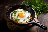 Fried egg parsley food meat. 