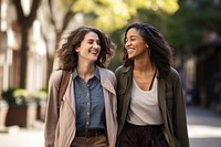 Women laughing smiling walking. 