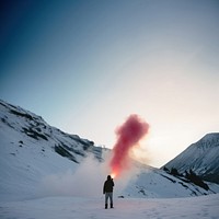 Hiker mountain smoke snow. 