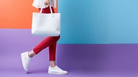 Woman hauling a white tote bag footwear handbag adult. 