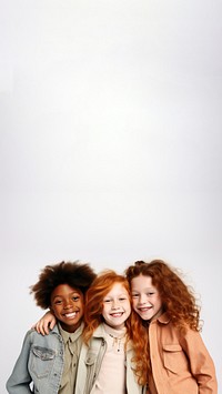 Three young kids laughing portrait adult. 