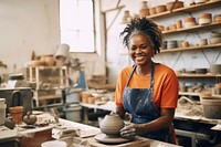 Pottery apron craftsperson entrepreneur. 