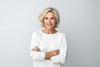 Middle age woman portrait sweater smiling. AI generated Image by rawpixel.