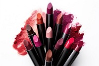 Lipsticks cosmetics white background arrangement. 