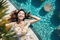 Happy woman swimming laughing cheerful. AI generated Image by rawpixel.