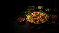 Chicken briyani paella plate food. 