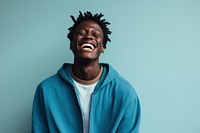 Teenage black boy laughing adult happy sweatshirt. AI generated Image by rawpixel.