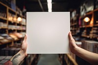 White cover holding shelf photo. 