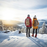 Rear of a Couple hikers with beautiful winter scene.  