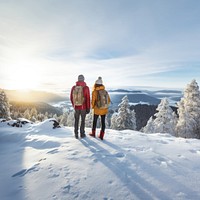 Rear of a Couple hikers with beautiful winter scene. AI generated Image by rawpixel. 