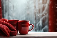 Red mugs winter coffee window. 