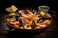 Spanish Cuisine seafood paella lobster. AI generated Image by rawpixel.