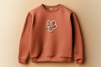 Brown sweater with flower