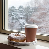 Coffee cup with donut