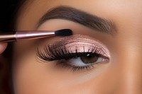 Woman applying eyeshadow cosmetics adult brush. AI generated Image by rawpixel.