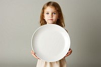 Kids plate porcelain portrait. AI generated Image by rawpixel.