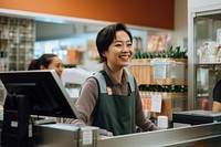 Supermarket checkout customer smiling. 