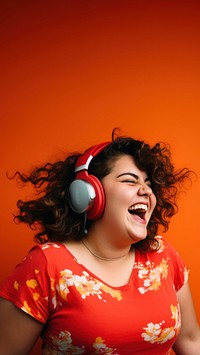 Woman wearing headphones laughing portrait adult. 