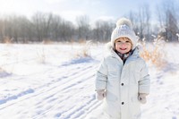 Happy kid snow coat outdoors. 