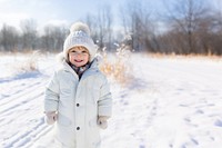 Happy kid snow coat cheerful. 