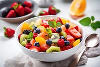 Fresh fruit salad bowl blueberry plant. 