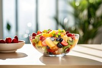 Fresh fruit salad bowl table food. 