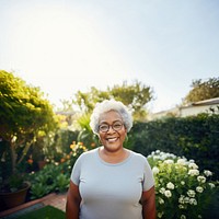 Chubby senior black portrait outdoors smiling. 