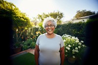 Chubby senior black garden portrait outdoors. 