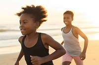 Happy black kids jogging running beach togetherness. 