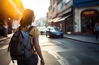 Backpacker woman walking vehicle street. 