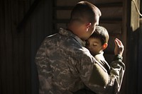 Soldier soldier uniform hugging. AI generated Image by rawpixel.