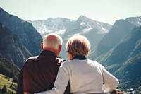 Happy mature couple mountain landscape outdoors. 