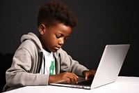 Black child student study online computer laptop concentration. 