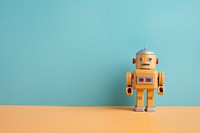 A robot toy astronaut cartoon yellow. AI generated Image by rawpixel.