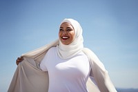 photo of a Musilm plus size woman wearing clean white hijab. 