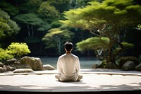 A japanese man meditation sitting adult contemplation. 