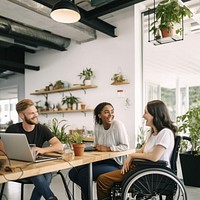 Diverse friends wheelchair computer working. 