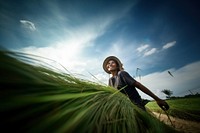 photo of a woman working sustainable farming. 