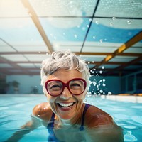 Mature woman swimming recreation portrait. AI generated Image by rawpixel.