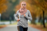 Woman in fashion hijab jogging