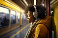 Woman listening to music with headphones. 