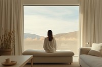 Woman sitting in her home. 