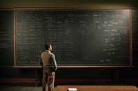 African american professor university blackboard writing. 