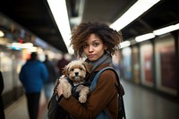 Puppy subway train black woman. 