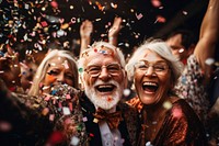 Diverse senior people party laughing confetti adult. 