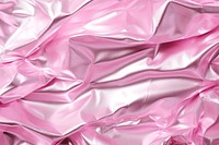 Aluminum foil pink Texture Background backgrounds textured silk. 