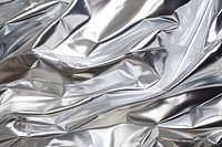 Aluminum foil Texture Background backgrounds textured aluminium. AI generated Image by rawpixel.